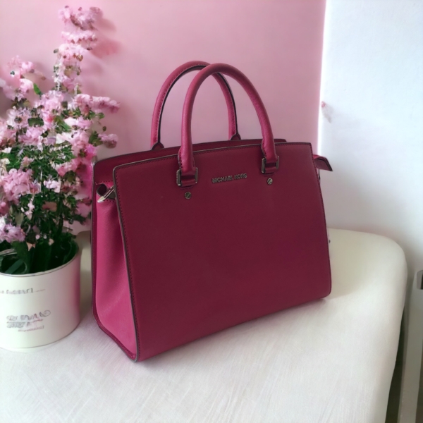 .Michael Kors käekott